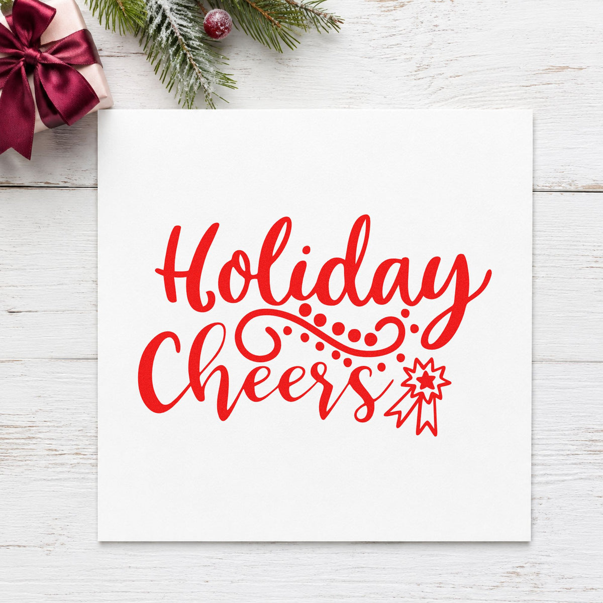 Holiday Cheers Starburst Flourish craft stamp in red ink on cardstock, an easy option for napkin band printing.