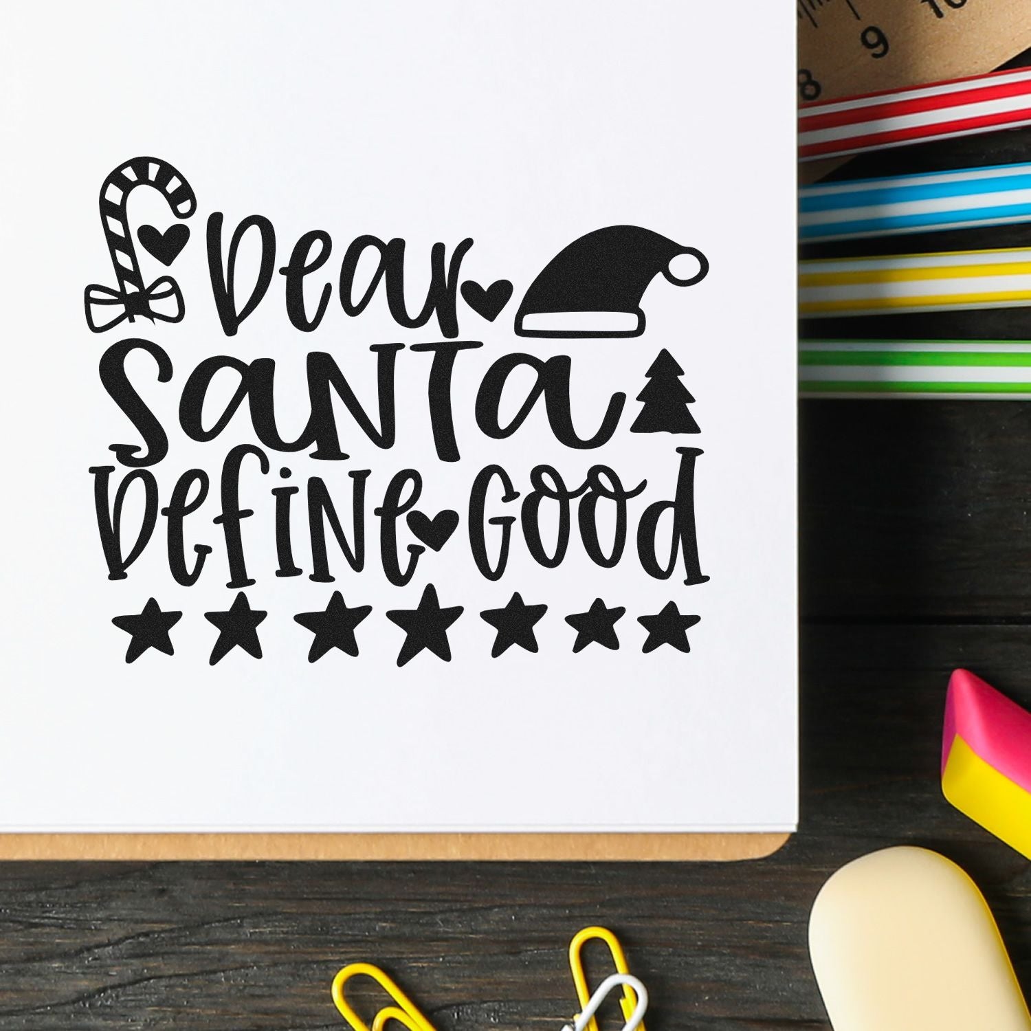 Christmas rubber stamp design with Dear Santa, define good text, candy cane, Santa hat, tree and stars.