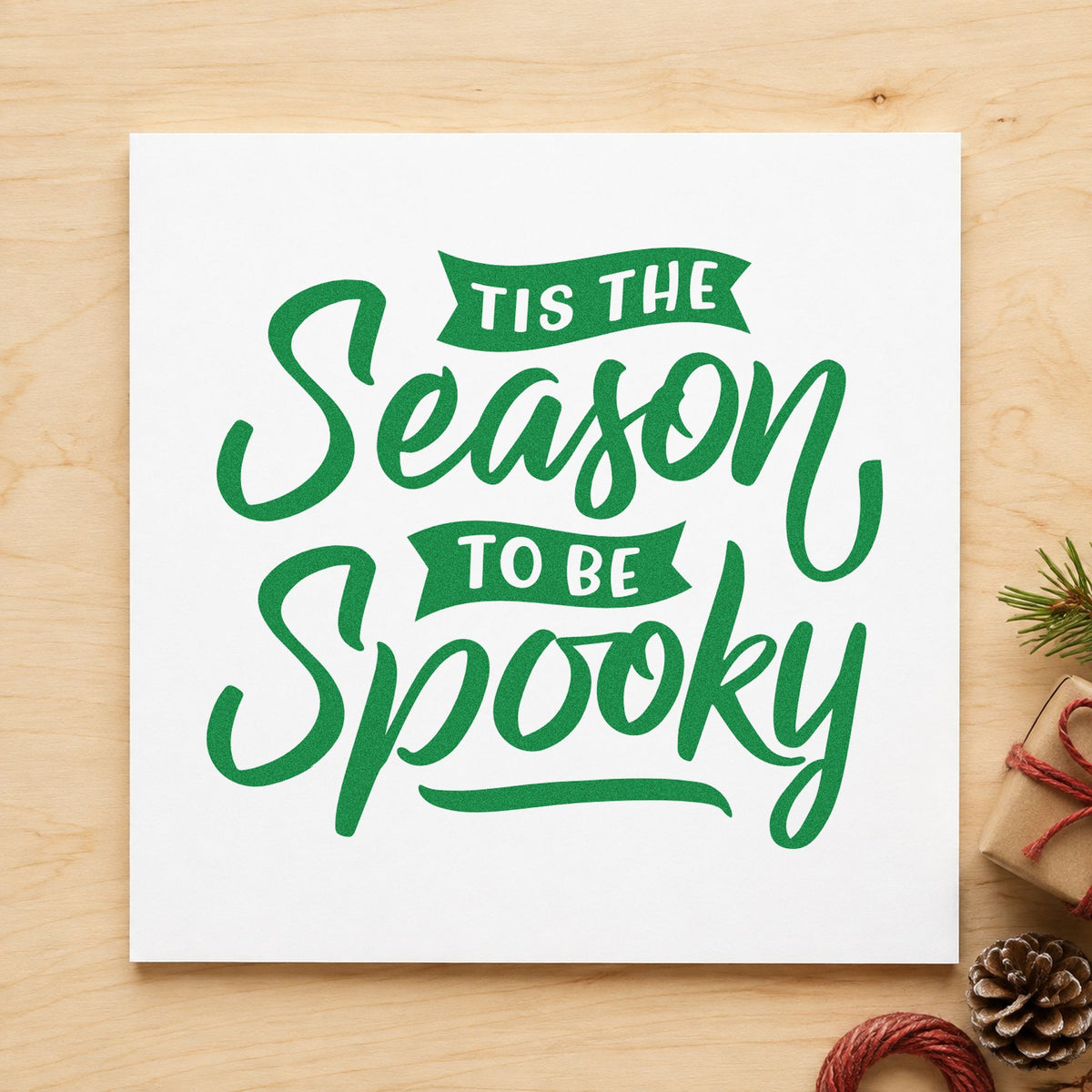 Season To Be Spooky craft stamp imprint in green ink on a handmade project, one idea being haunt tour cards.