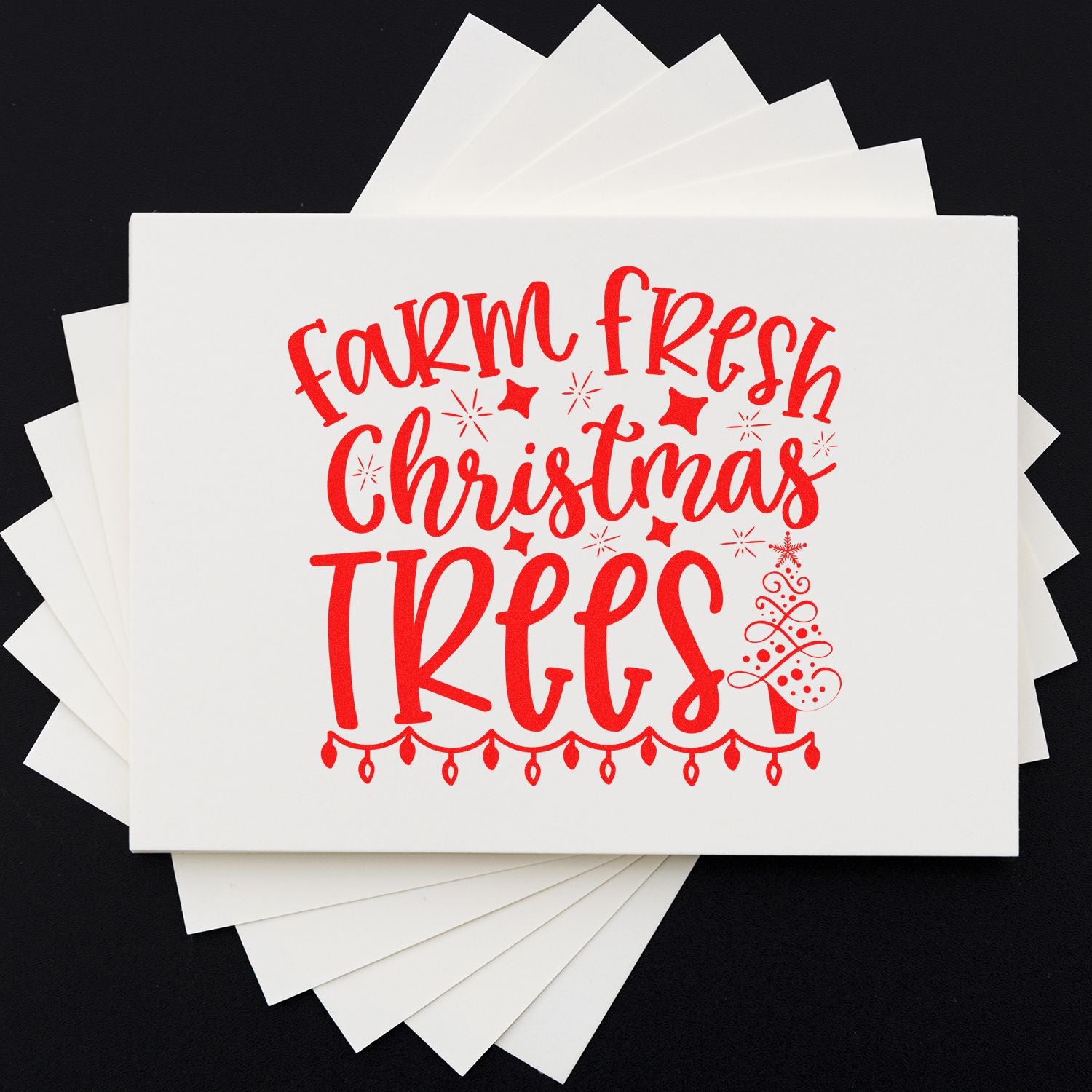 Farm fresh Christmas trees rubber stamp design on sample paper, ideal for holiday cards, gift tags, and festive packaging.