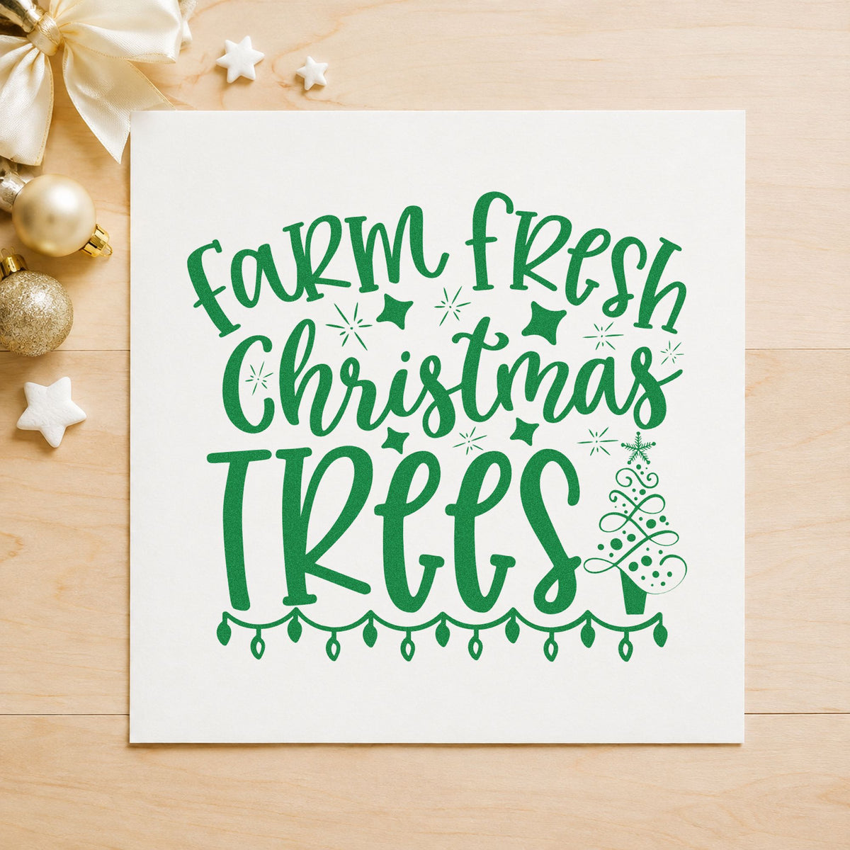 Farm Fresh Christmas Trees craft stamp imprint in green ink on a handmade project, one idea being flocked tree tags.