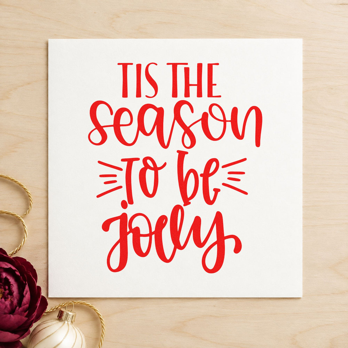 Tis The Season Jolly craft stamp in red ink on cardstock, an easy option for tote panel printing.