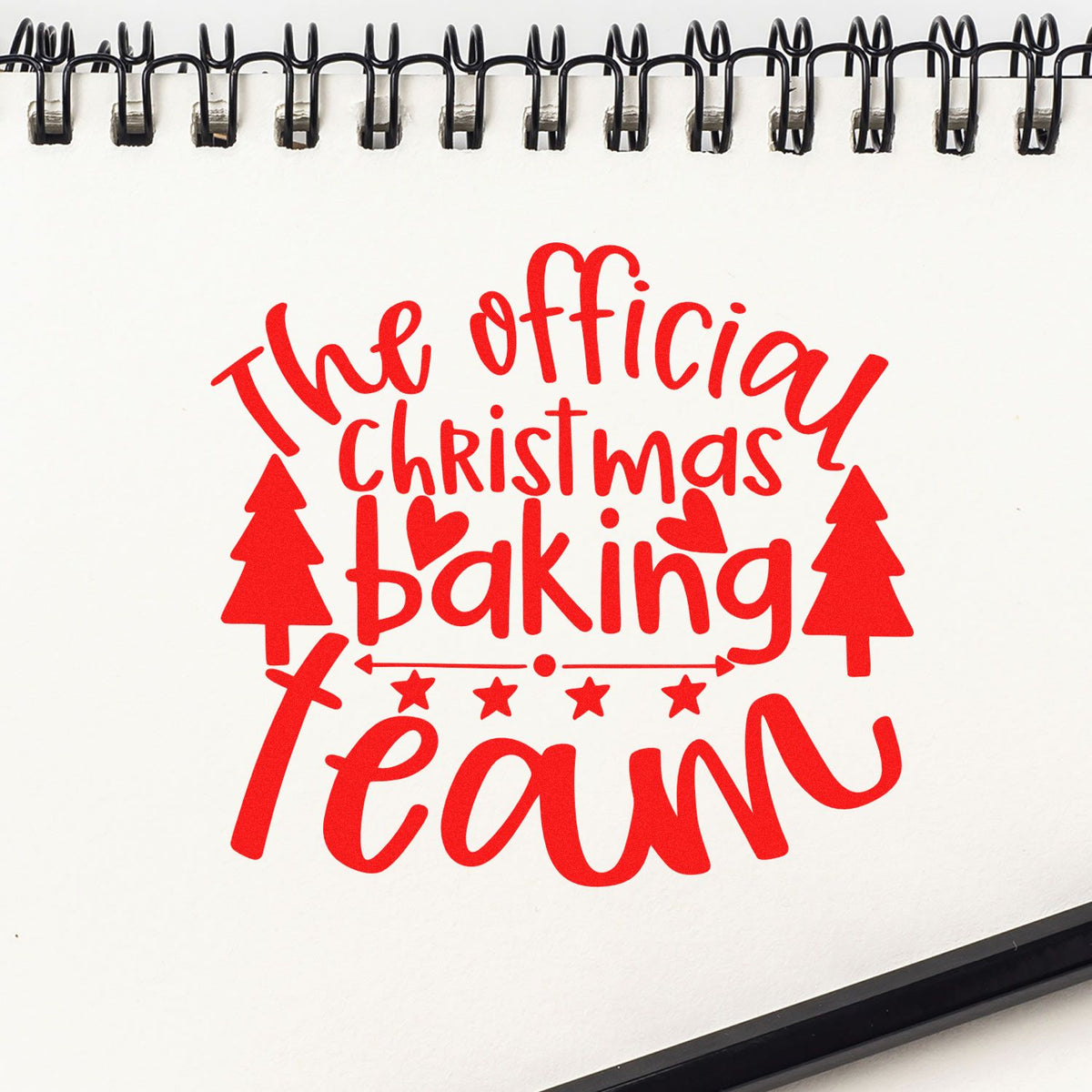 Official Christmas Baking Team rubber stamp shown in red ink, stamped for projects such as bracket album page.