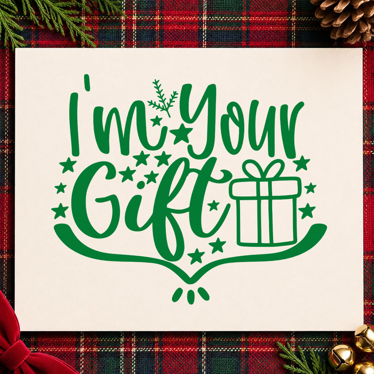 I'm Your Gift Present craft stamp imprint in green ink on a handmade project, one idea being bow topper tags.