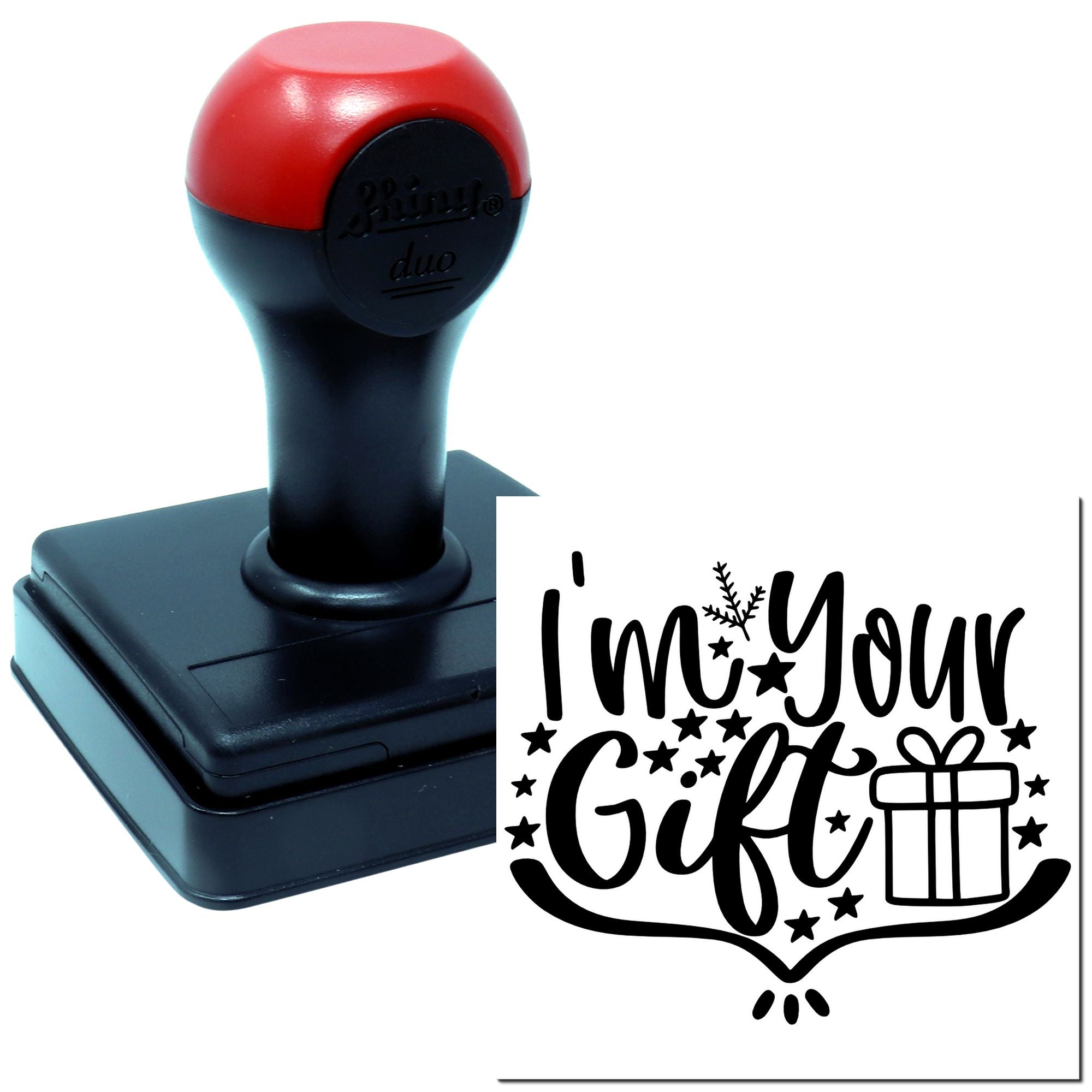 Self-inking rubber stamp with Im Your Gift design, stars, and present graphic for holiday gift packaging.