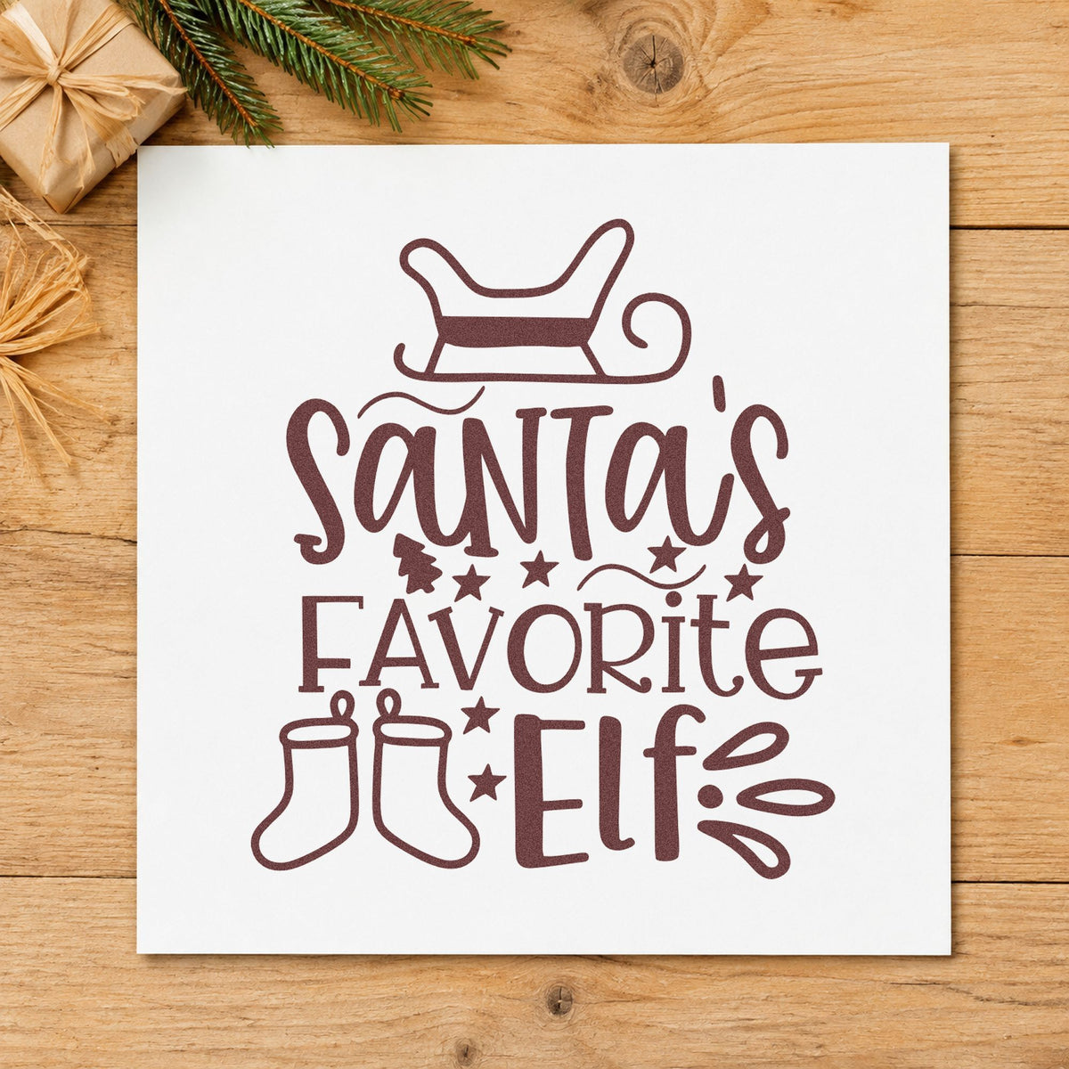 Santa's Favorite Elf Stockings rubber stamp printed in brown ink, ready for filler split sheet and similar paper crafts.