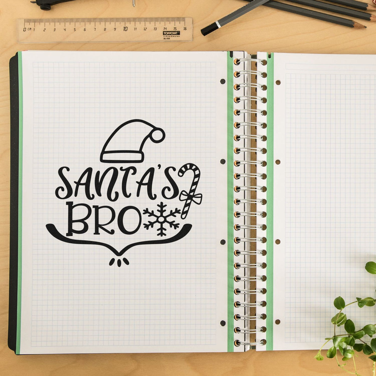 Santa's Bro Hat Candy Cane Premium Wooden Stamp - Vintage Pro imprint stamped in black ink. The words "Santa's bro" appear with a Santa hat, candy cane, snowflake, and curved underline.