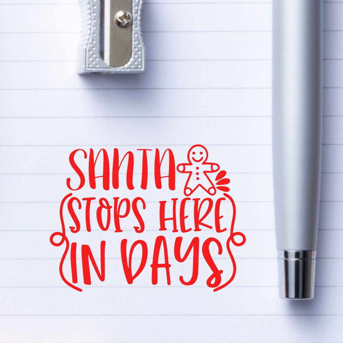 Christmas rubber stamp design reading Santa stops here in days with gingerbread man for holiday countdown cards and planner use.