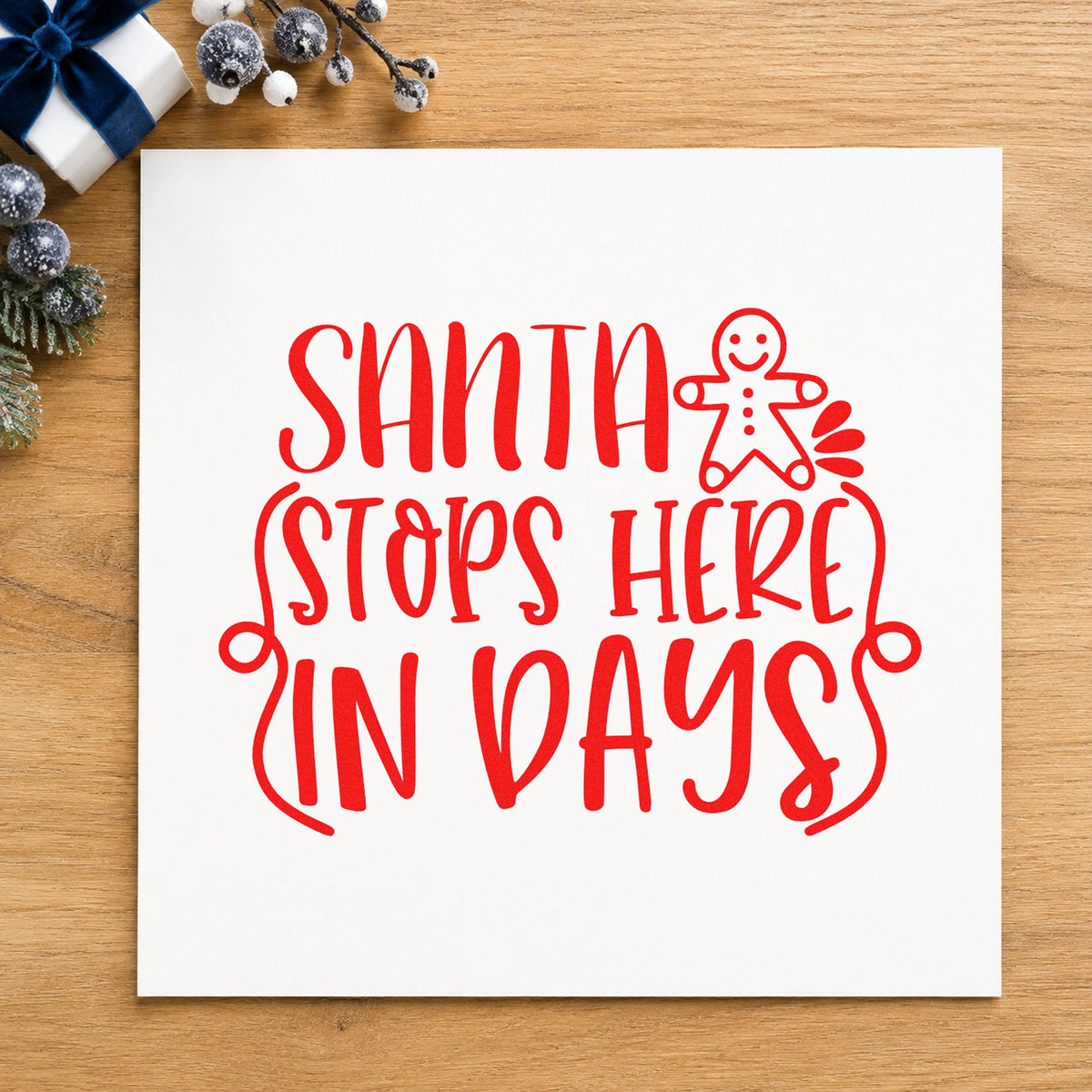 Santa Stops Here In Days craft stamp in red ink on cardstock, an easy option for yard flag printing.
