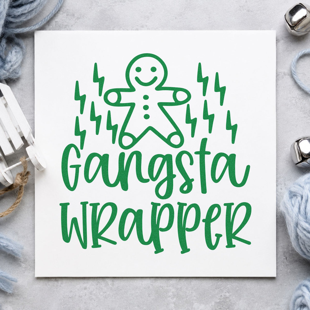 Gangsta Wrapper Gingerbread Lightning craft stamp imprint in green ink on a handmade project, one idea being race entry cards.