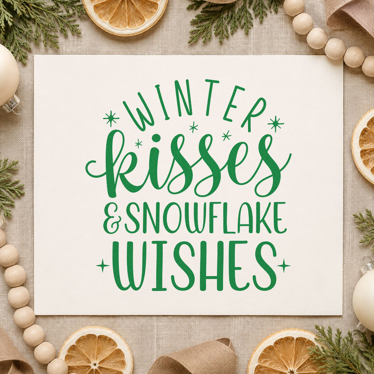 Winter Kisses Snowflake Wishes craft stamp imprint in green ink on a handmade project, one idea being chocolate box tags.
