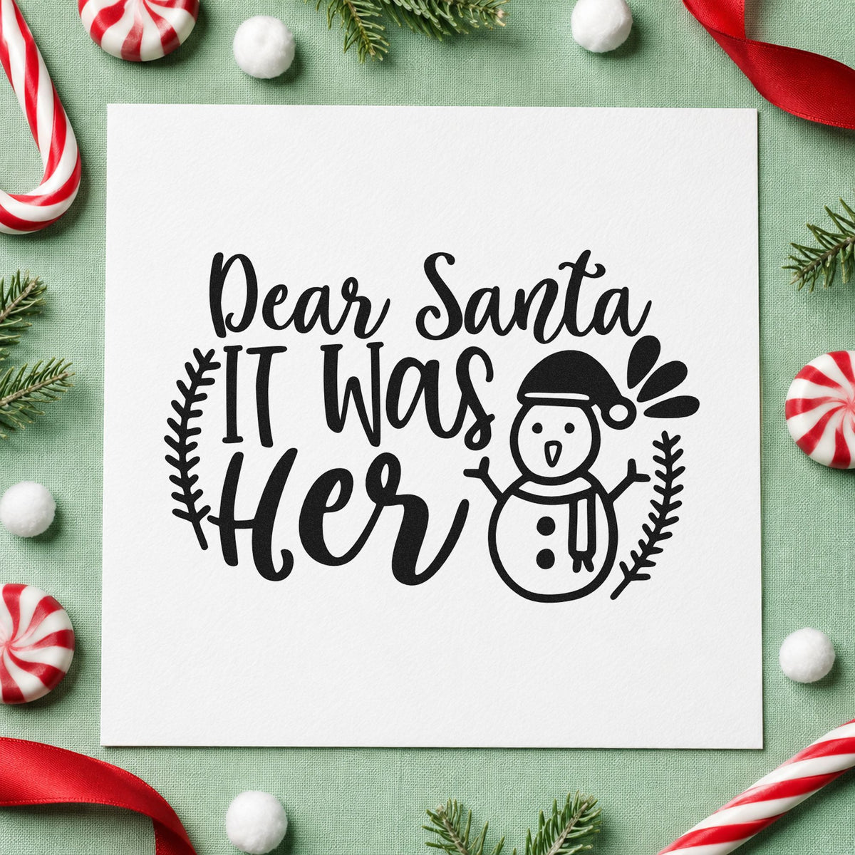 Dear Santa It Was Her rubber stamp printed in black ink, ready for snowman between cards and similar paper crafts.