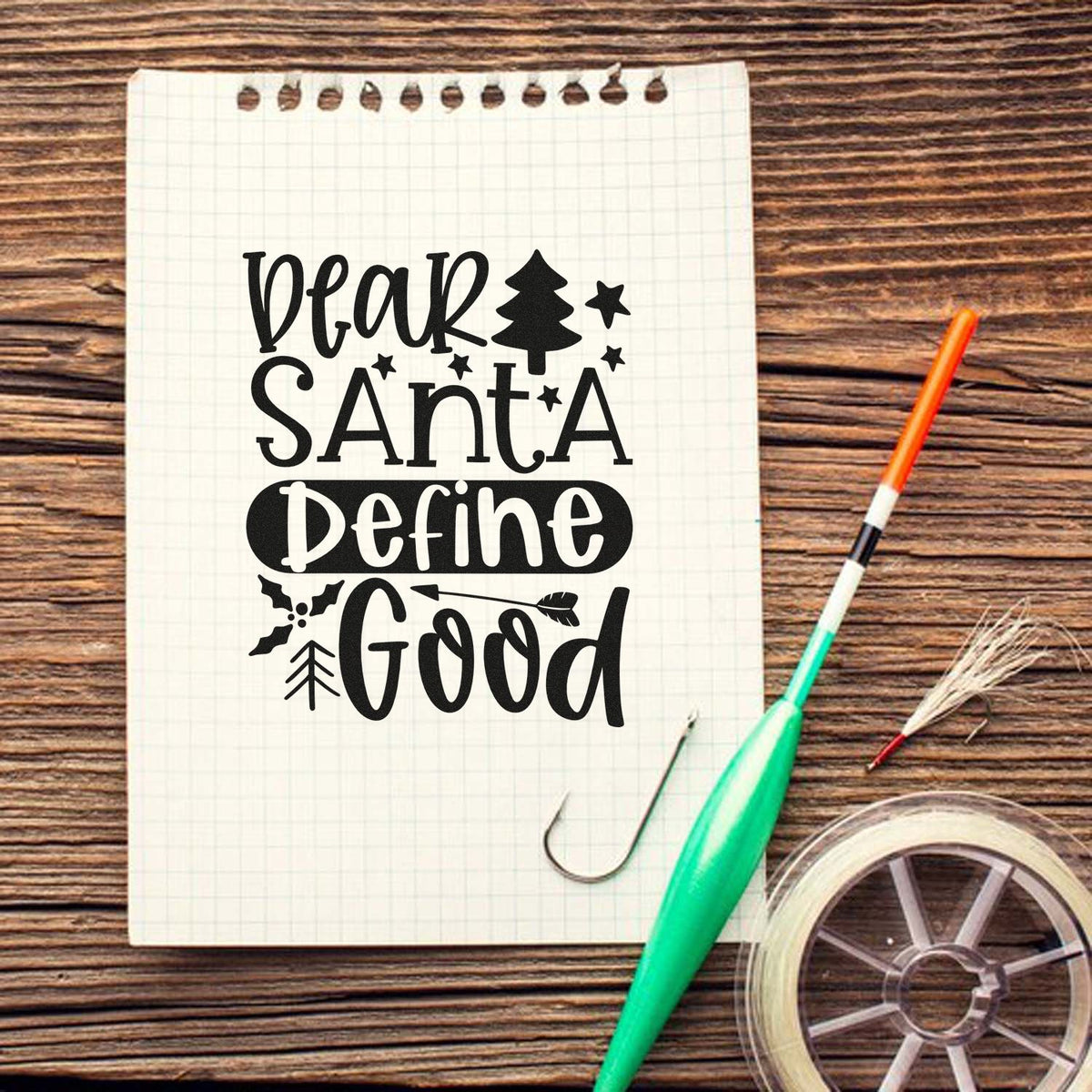 Dear Santa Define Good Tree Holly Premium Wooden Stamp - Vintage Pro imprint stamped in black ink. The phrase "Dear Santa define good" includes a tree, stars, holly, and a downward arrow.