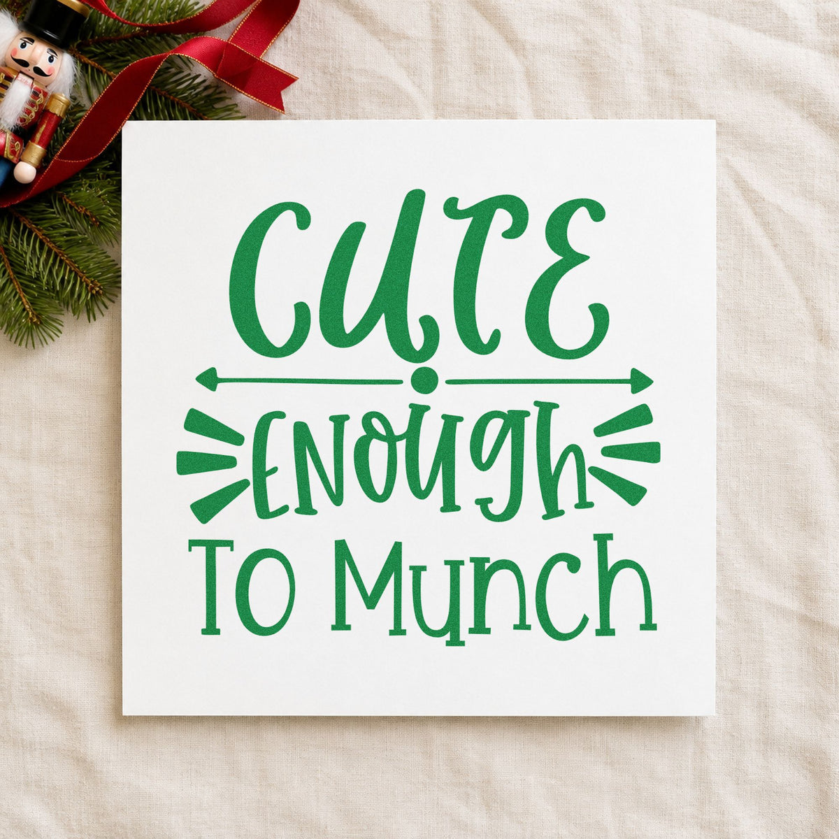 Cute Enough To Munch craft stamp imprint in green ink on a handmade project, one idea being meet baby cards.