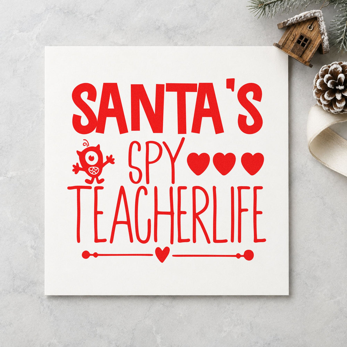 Santa's Spy Teacher Life rubber stamp shown in red ink, stamped for projects such as supply cart labels.
