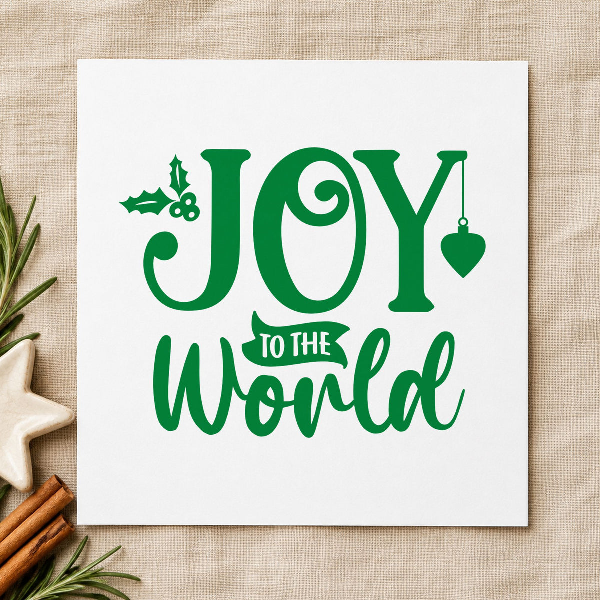 Joy To The World Holly craft stamp imprint in green ink on a handmade project, one idea being heart loop gift tags.