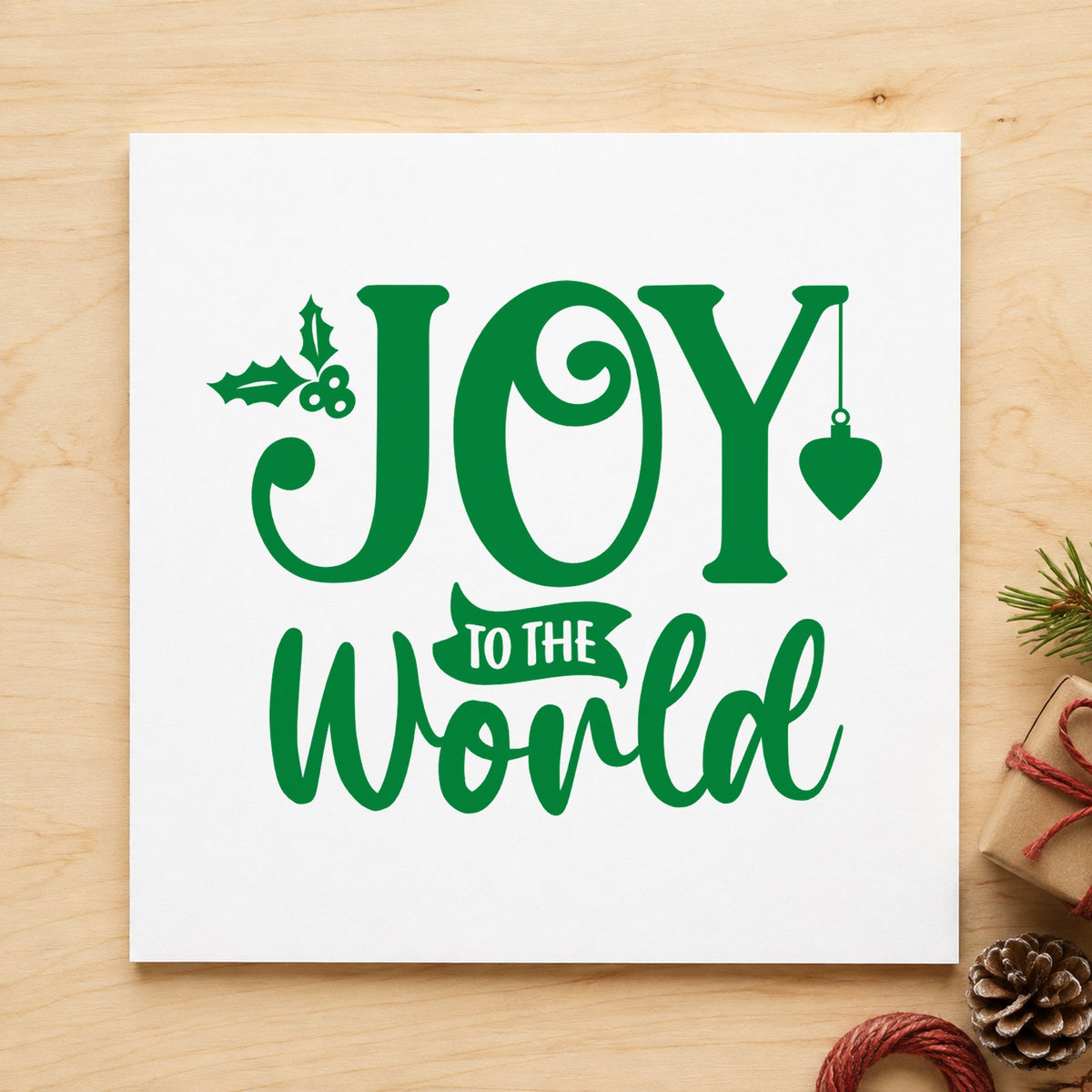 Joy To The World Holly craft stamp imprinted in green ink on paper, a design suited to framed window hook.