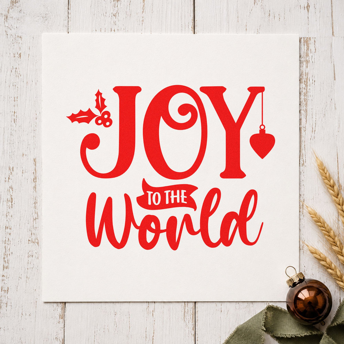 Joy To The World Holly rubber stamp shown in red ink, stamped for projects such as ornament tub labels.