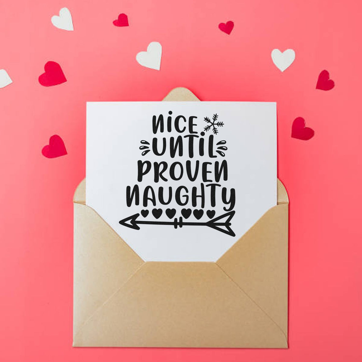 Nice Until Proven Naughty Snowflakes Stamp - Premium Vintage Pro Wooden imprint stamped in black ink. The words "Nice until proven naughty" include a snowflake, hearts, and a double-ended arrow.