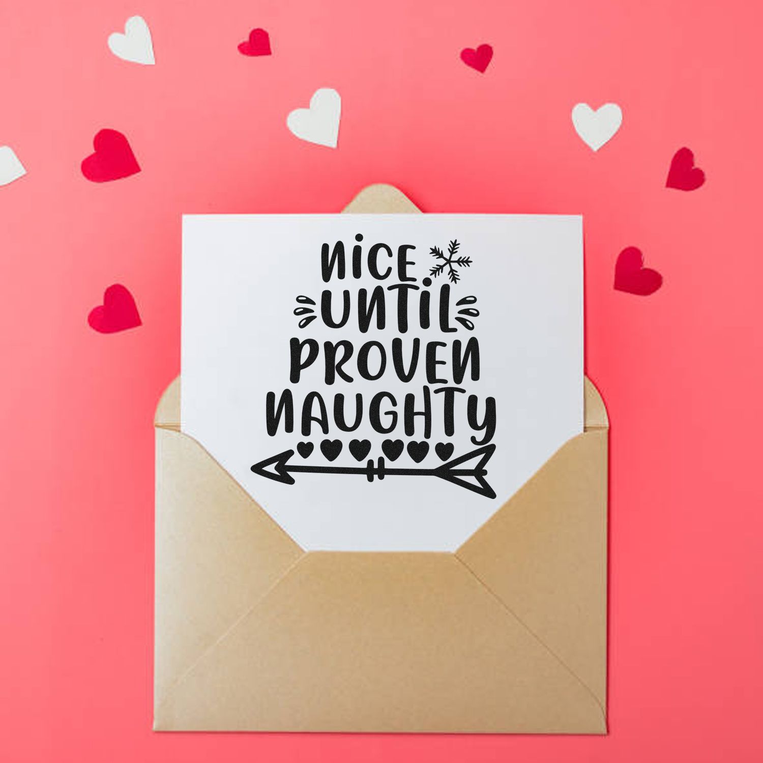 Nice Until Proven Naughty rubber stamp on a holiday card in an envelope with heart accents