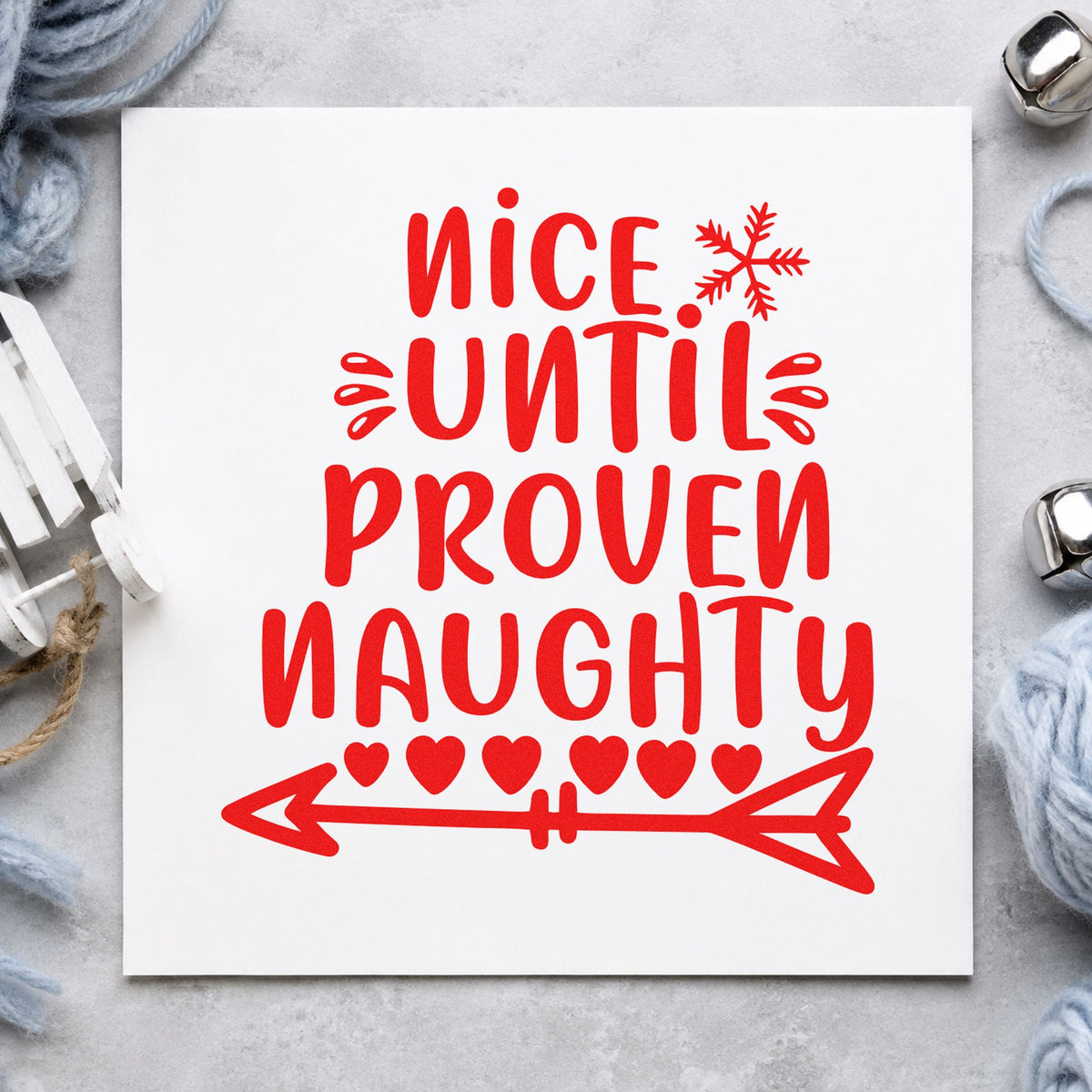 Nice Until Proven Naughty rubber stamp shown in red ink, stamped for projects such as file box labels.