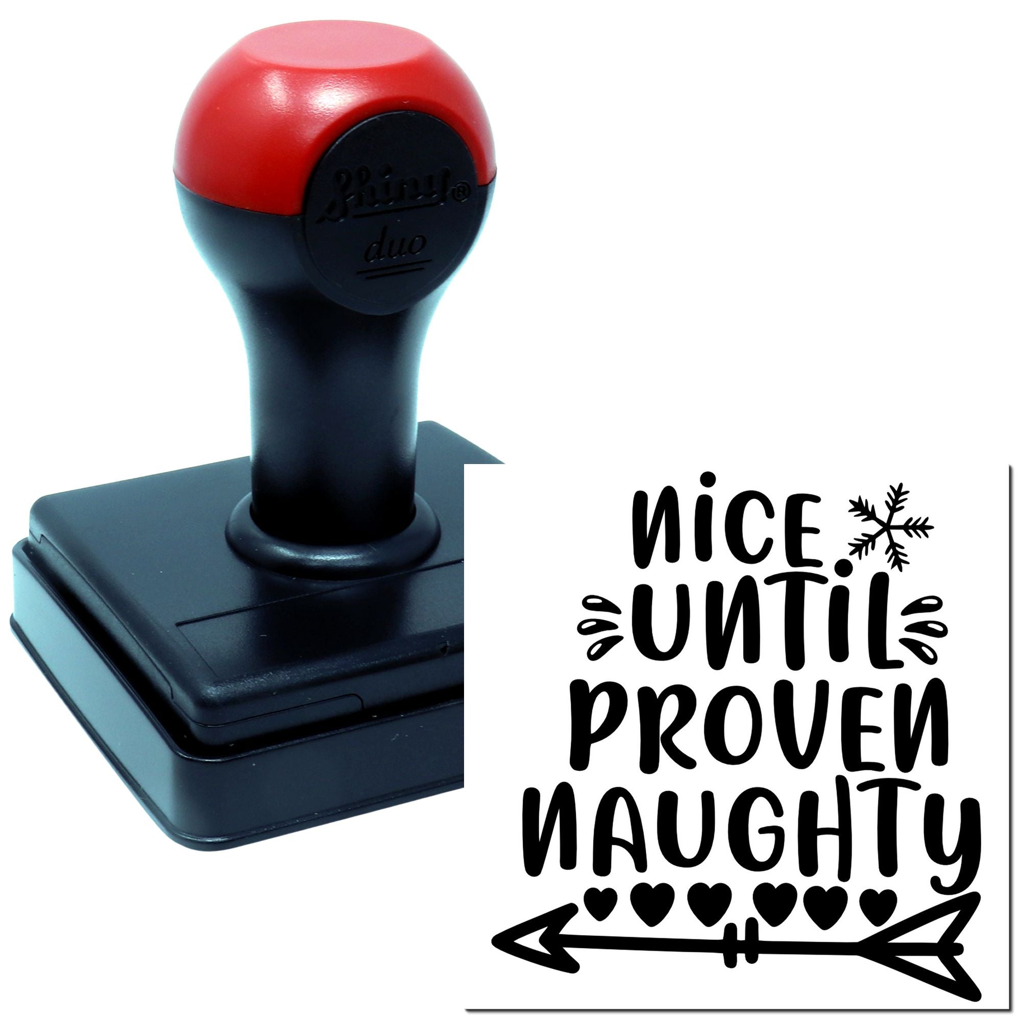 Self-inking rubber stamp with Nice Until Proven Naughty holiday design, featuring snowflake, hearts, and arrow.