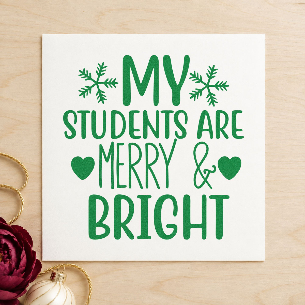 Students Merry And Bright craft stamp imprint in green ink on a handmade project, one idea being student gift tags.
