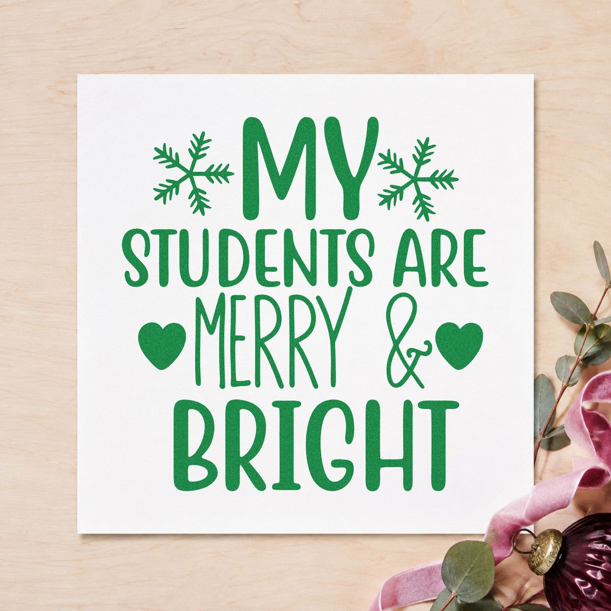 Students Merry And Bright craft stamp imprint in green ink on a handmade project, one idea being family note cards.