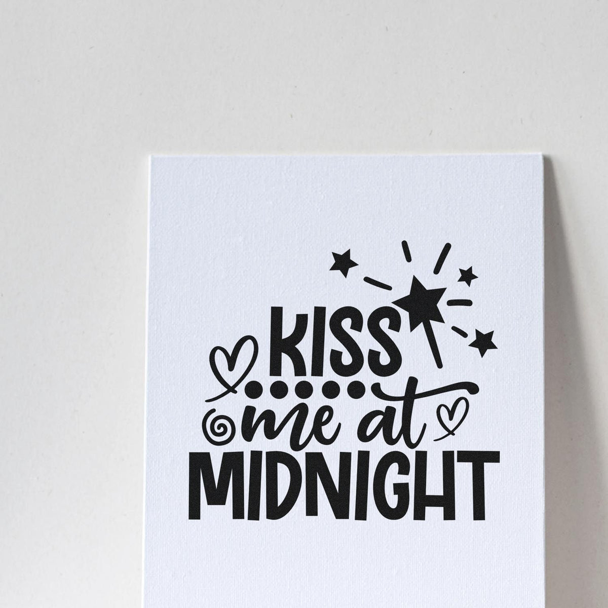 Kiss Me At Midnight Stamp - Premium Vintage Pro Wooden imprint stamped in black ink. The words "Kiss me at midnight" include hearts, stars, dots, and a radiating starburst.