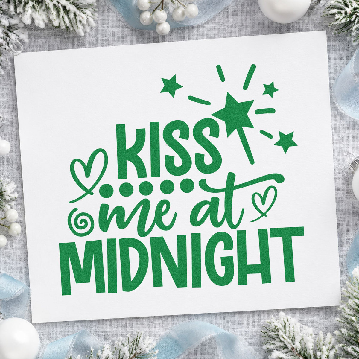 Kiss Me At Midnight craft stamp imprint in green ink on a handmade project, one idea being countdown placards.