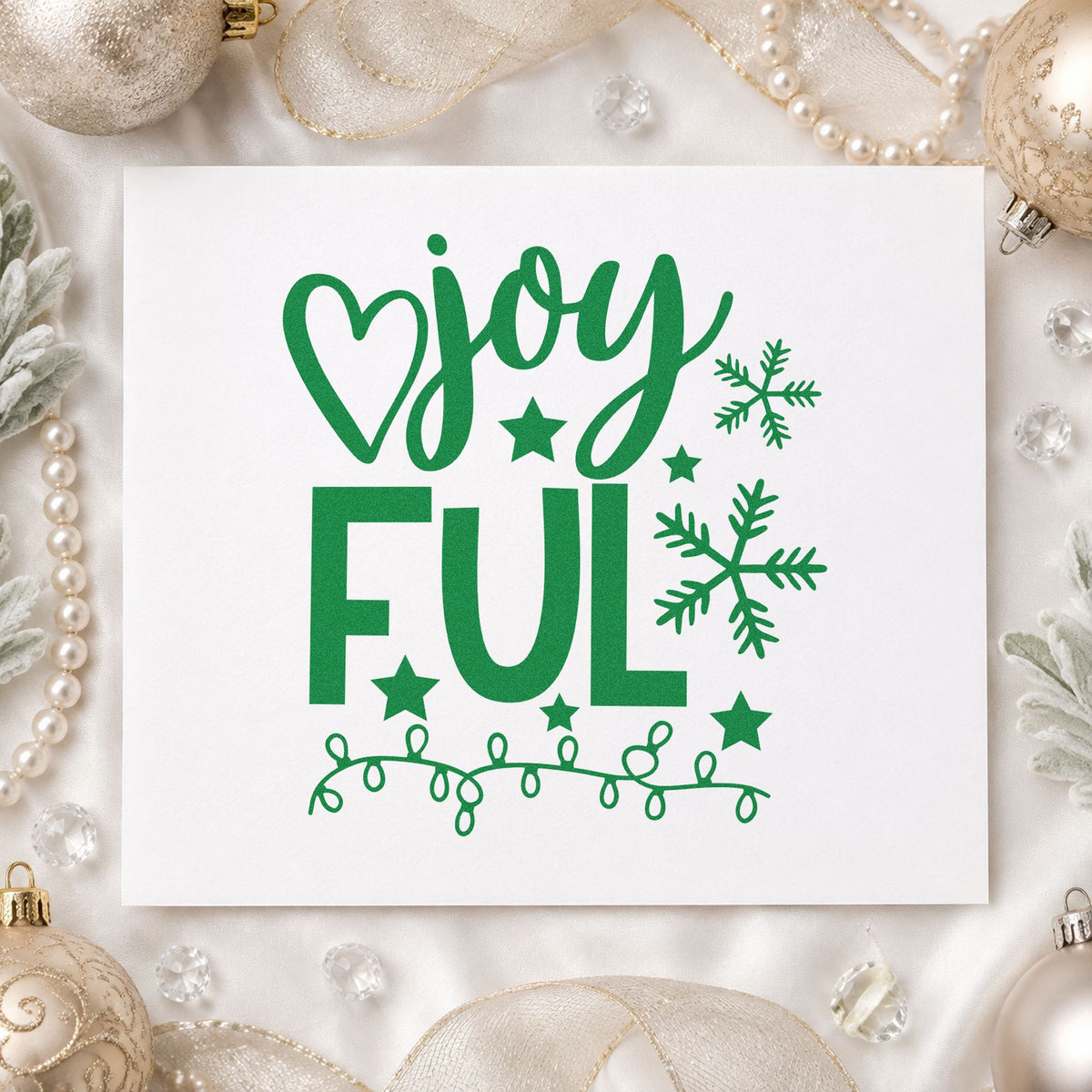 Joyful Snowflakes And Lights craft stamp imprint in green ink on a handmade project, one idea being strand loop tags.