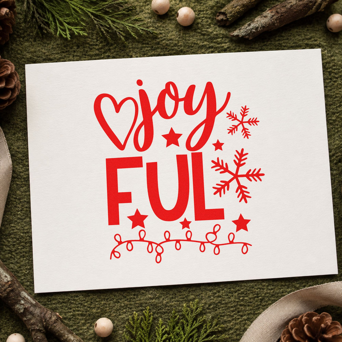 Joyful Snowflakes And Lights rubber stamp shown in red ink, stamped for projects such as reel bin labels.