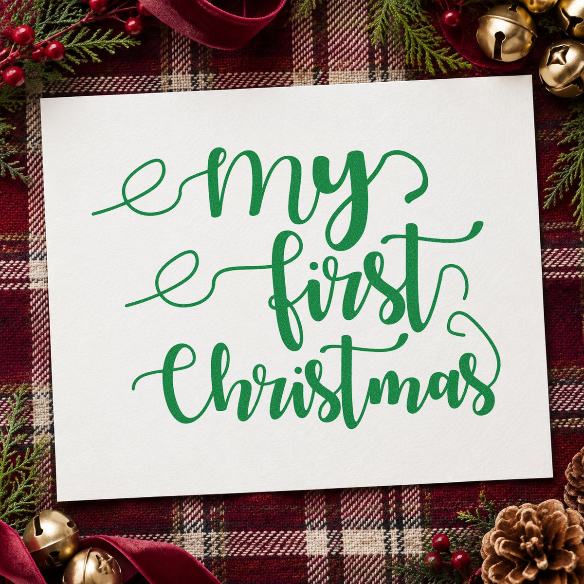 My First Christmas Script craft stamp imprint in green ink on a handmade project, one idea being naming day cards.