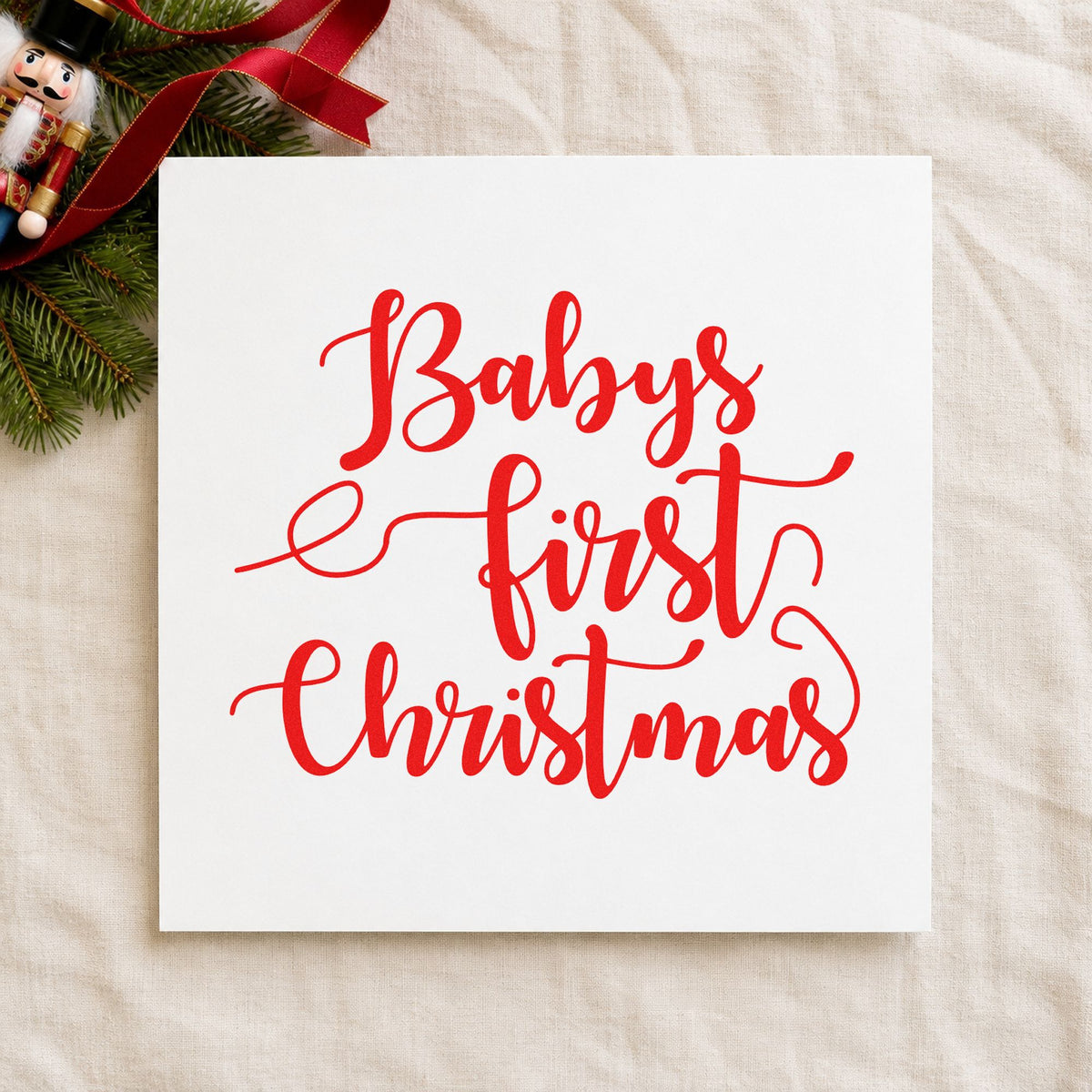 Baby's First Christmas Script rubber stamp shown in red ink, stamped for projects such as gift bin labels.