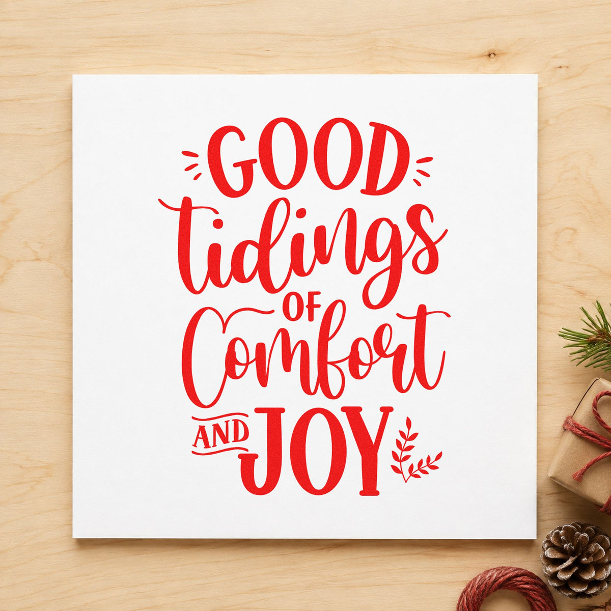 Good Tidings Comfort And Joy craft stamp in red ink on cardstock, an easy option for lap throw printing.
