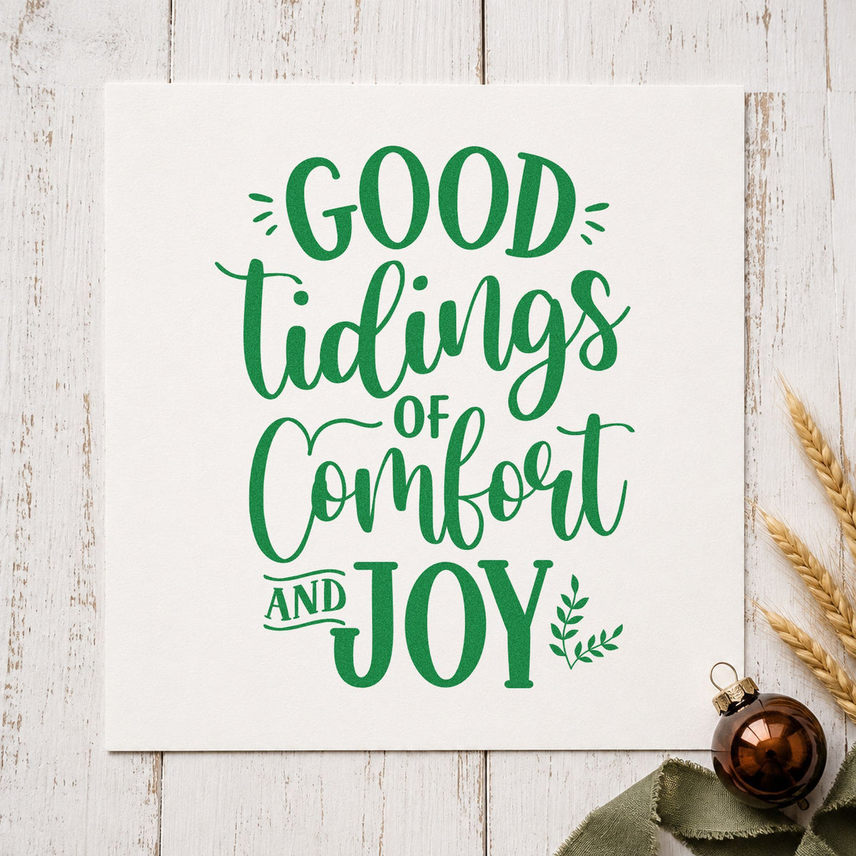 Good Tidings Comfort And Joy craft stamp imprinted in green ink on paper, a design suited to framed quiet corner.