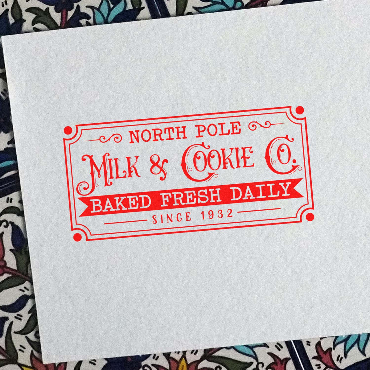 North Pole Milk Cookie Company rubber stamp shown in red ink, stamped for projects such as dairy route album.