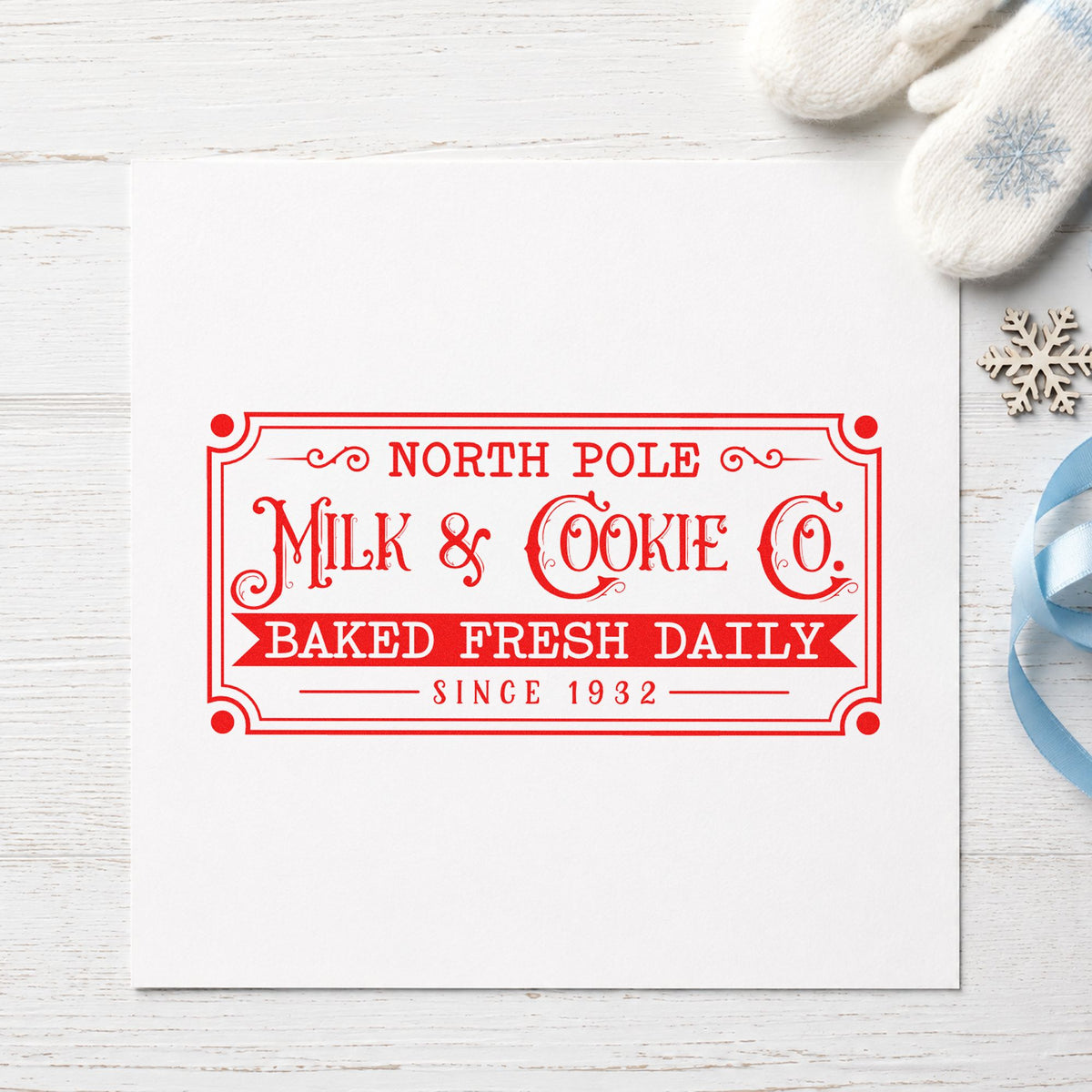 North Pole Milk Cookie Company craft stamp in red ink on cardstock, an easy option for milk crate printing.