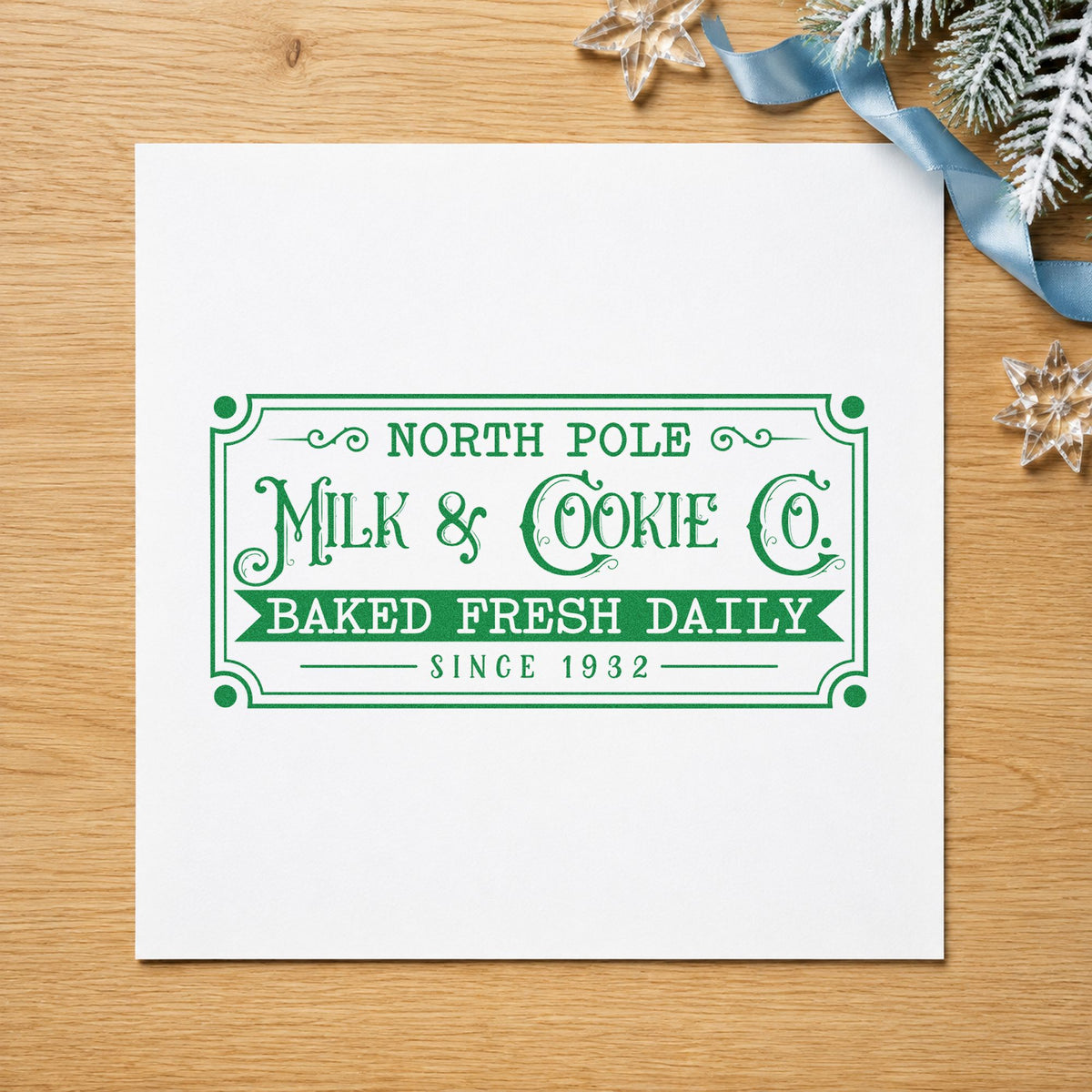 North Pole Milk Cookie Company craft stamp imprint in green ink on a handmade project, one idea being route card slips.