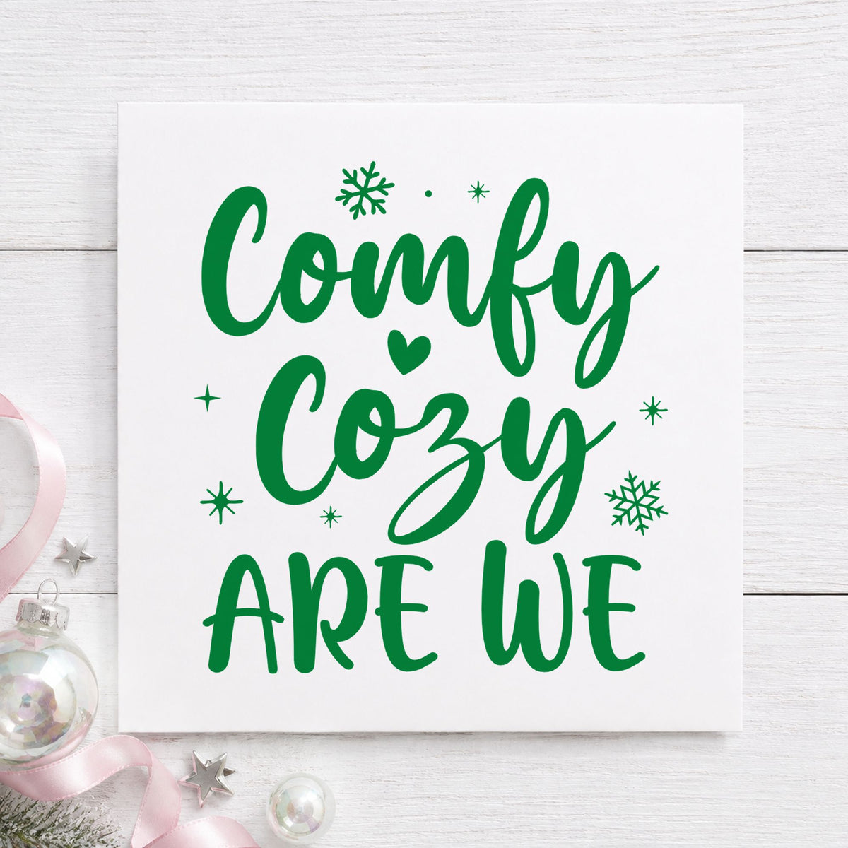 Comfy Cozy Are We craft stamp imprint in green ink on a handmade project, one idea being slipper gift tags.