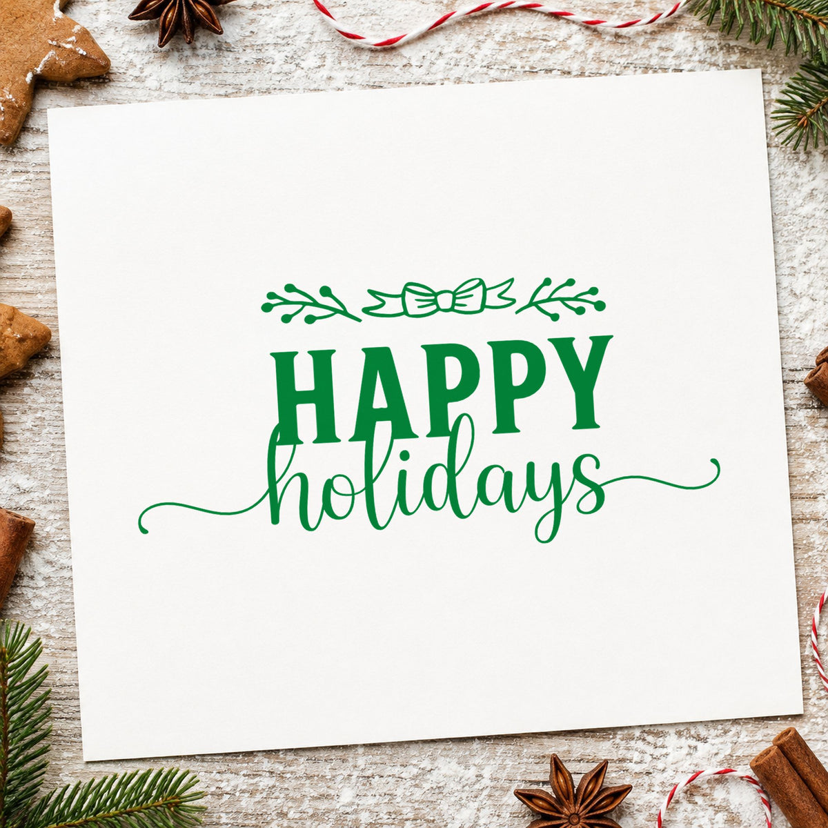 Happy Holidays Leafy Flourish craft stamp imprinted in green ink on paper, a design suited to framed double rule.