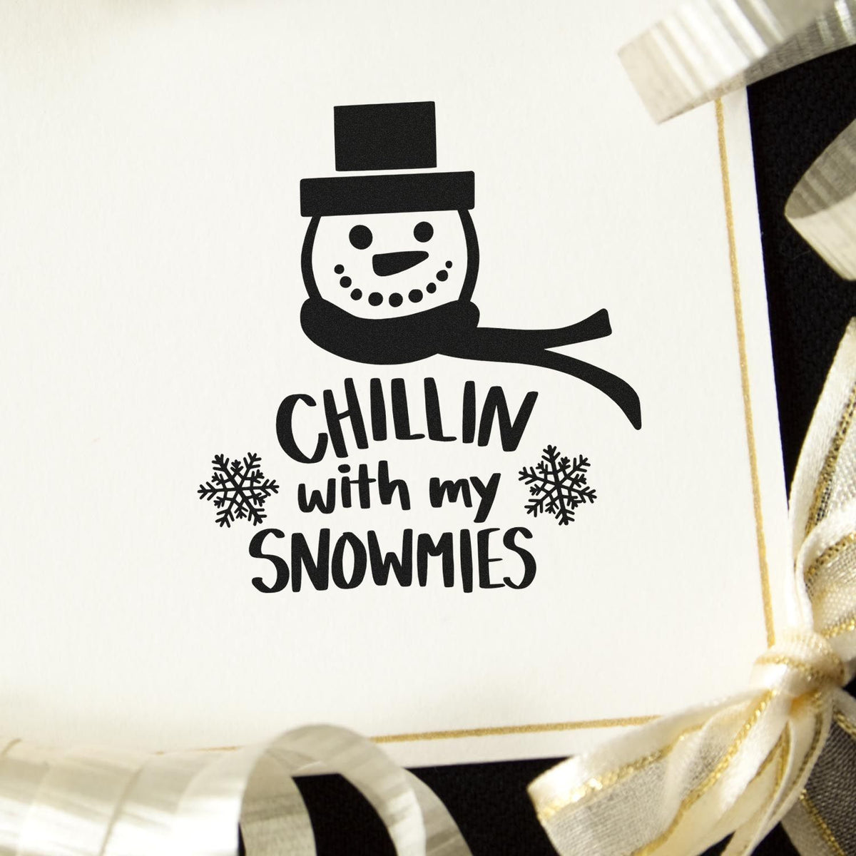 Premium Wooden Chillin With My Snowmies Snowman Stamp - Vintage Pro imprint stamped in black ink. A smiling snowman in a top hat and scarf appears above "Chillin with my snowmies" with snowflakes.
