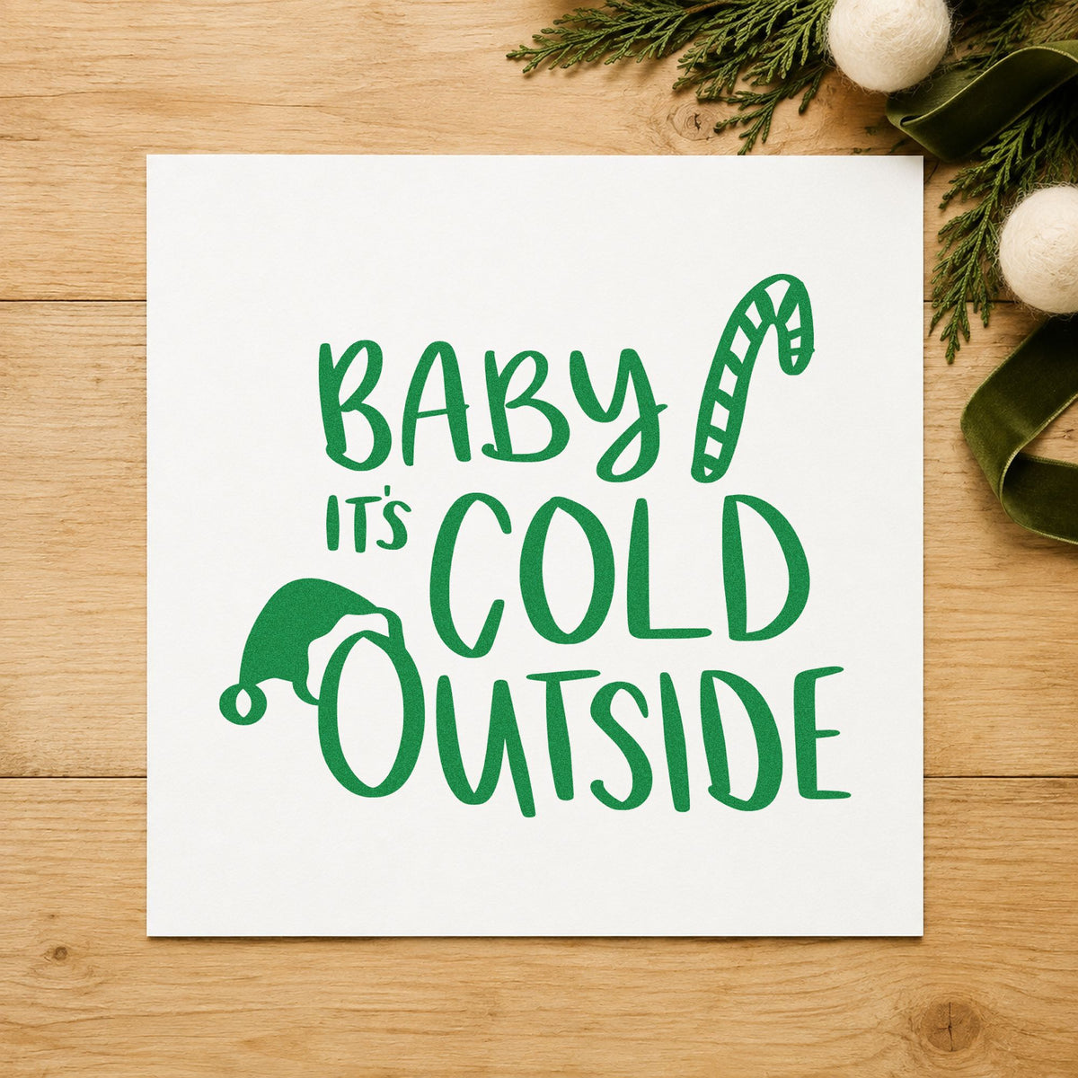 Baby It's Cold Outside Hat craft stamp imprinted in green ink on paper, a design suited to framed playroom door.
