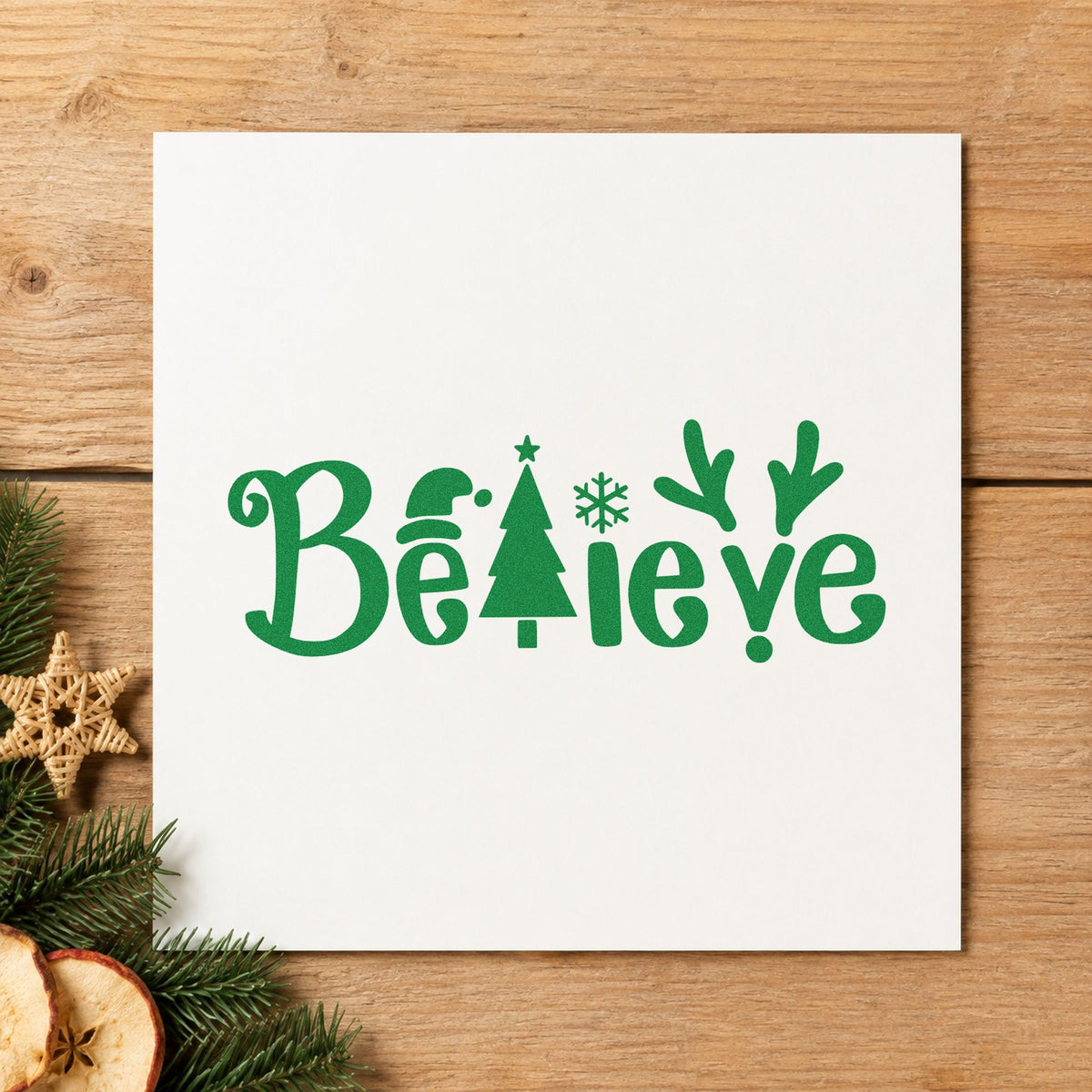Believe Holiday Lettering Icons craft stamp imprint in green ink on a handmade project, one idea being detail gift tags.