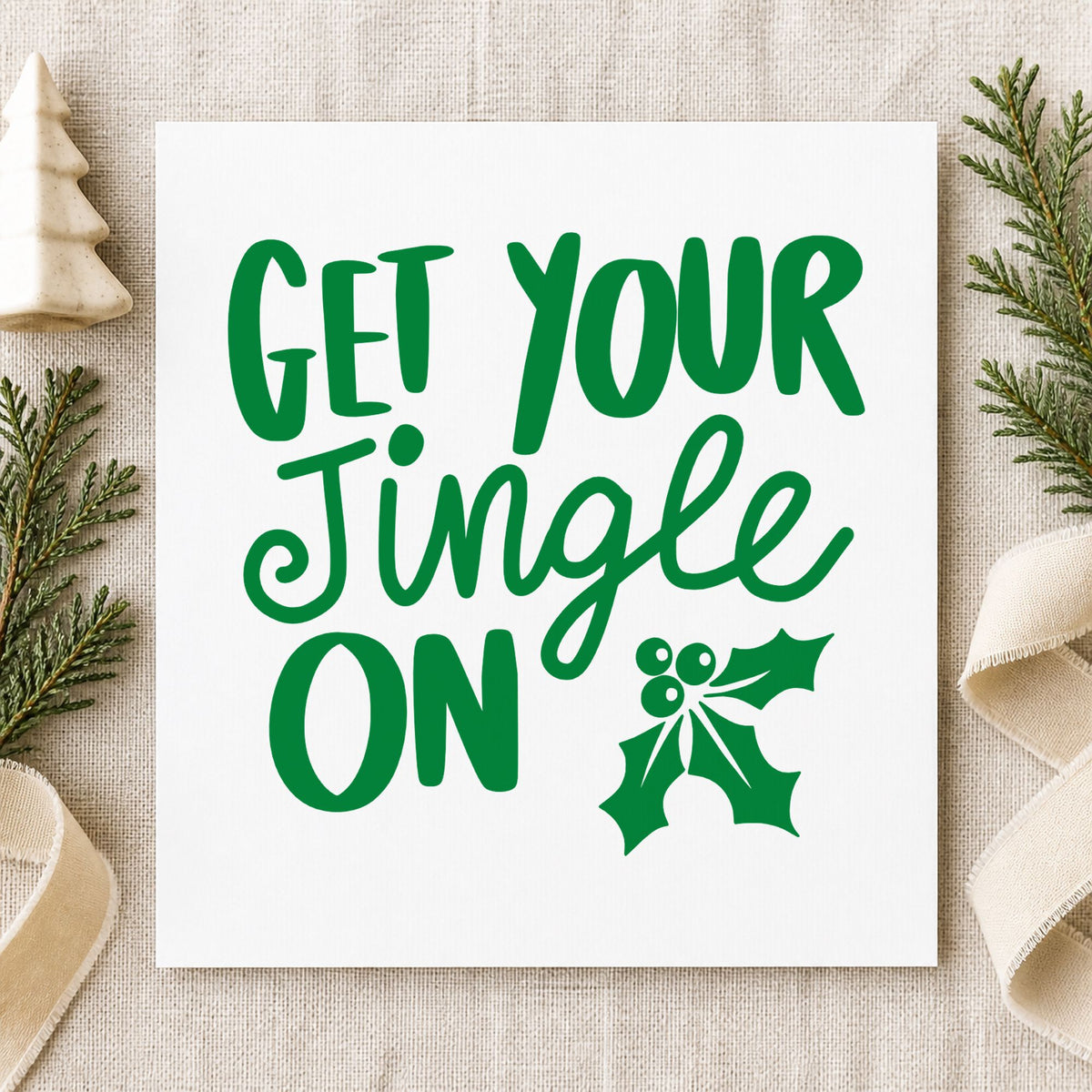 Get Your Jingle On Holly craft stamp imprint in green ink on a handmade project, one idea being entry wrist tags.
