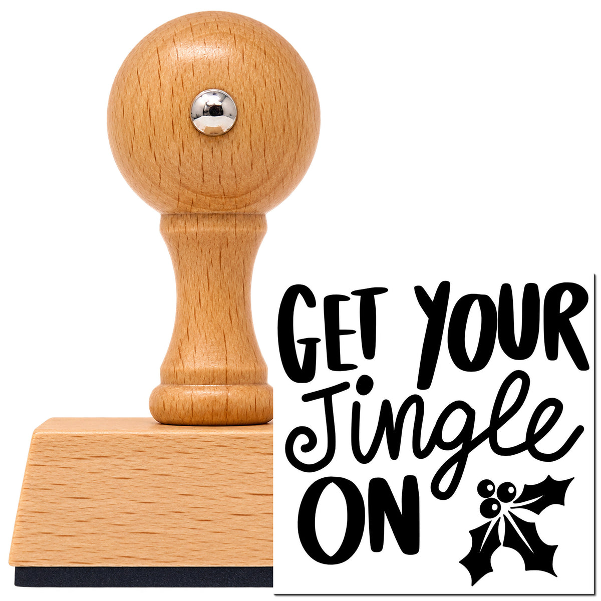 Get Your Jingle On Holly Vintage Pro rubber stamp in European beech wood with a round knob handle, shown beside its black imprint.