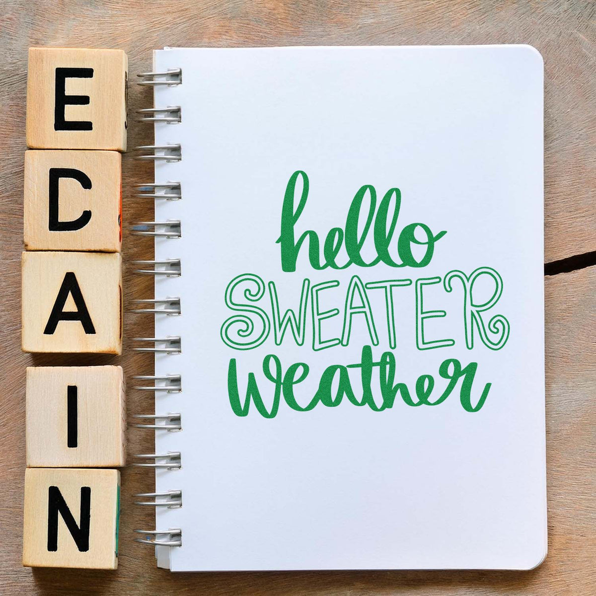 Hello Sweater Weather Lettering rubber stamp shown in green ink, stamped for projects such as line study album.
