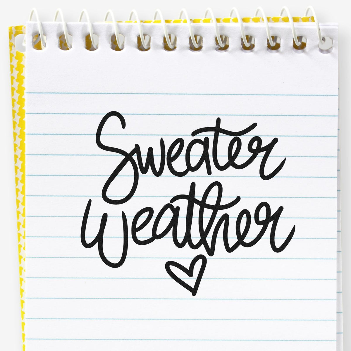 Vintage Pro Sweater Weather Little Heart Premium Wooden Stamp imprint stamped in black ink. The script words "Sweater weather" appear above a small outlined heart.