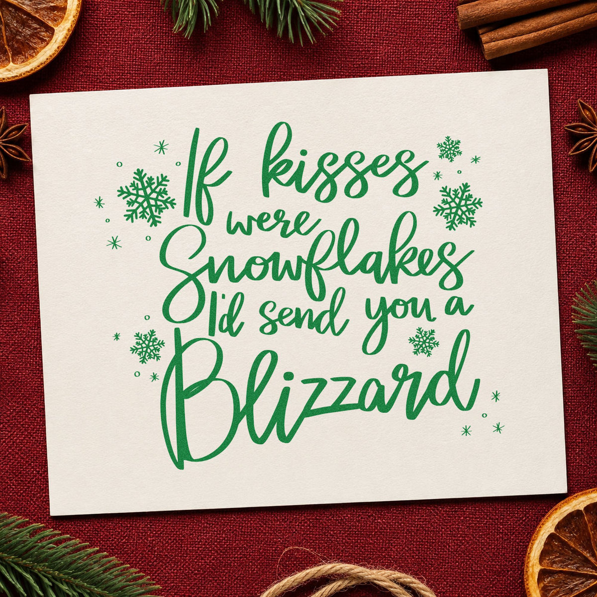 Kisses Snowflakes Blizzard Quote craft stamp imprint in green ink on a handmade project, one idea being visit plan cards.