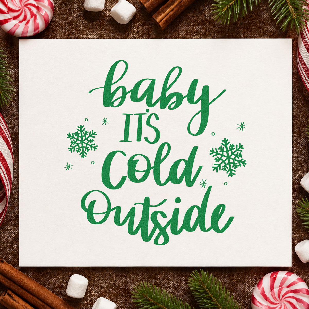 Baby Cold Outside Snowflakes craft stamp imprint in green ink on a handmade project, one idea being bulk gift tags.